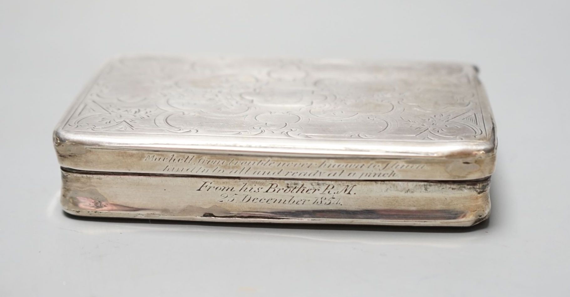 A Dutch white metal snuff box, 92mm and a George V silver card case/purse, Birmingham, 1916.